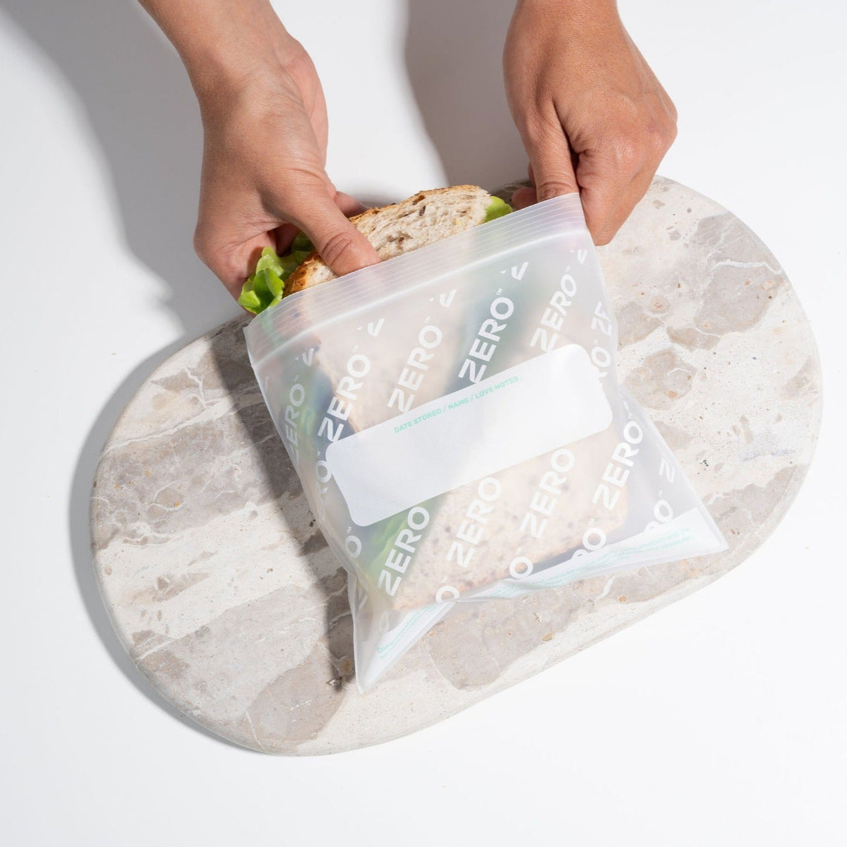 ZERO Plastic-Free Resealable Sandwich Bag on a stone board