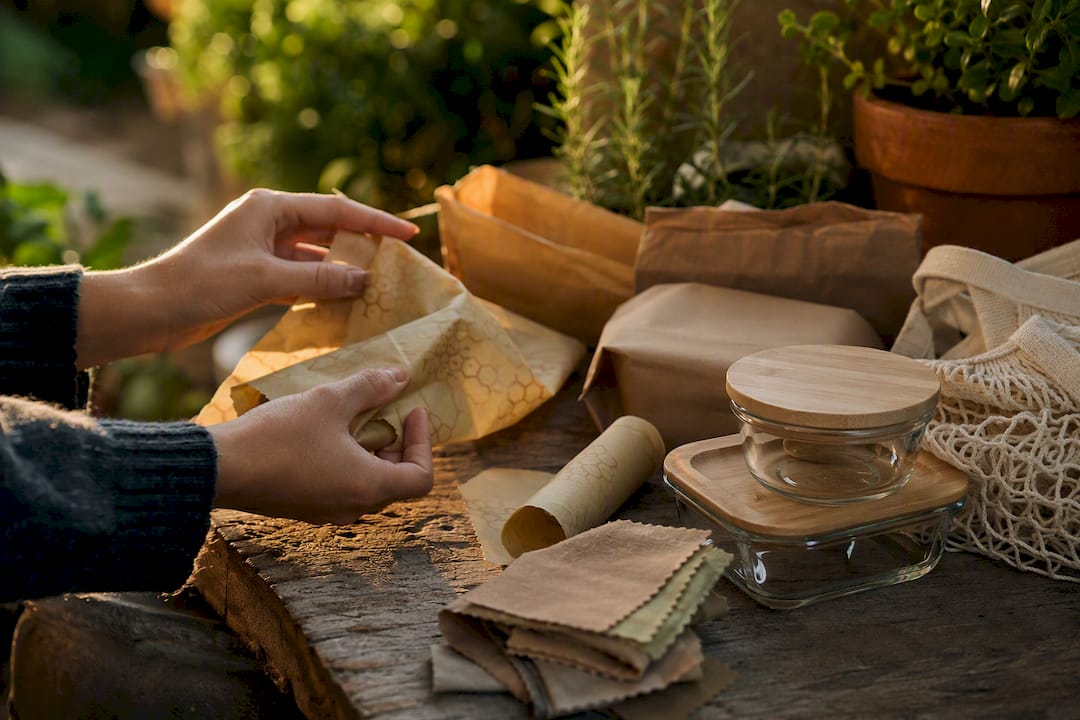 Hands sorting eco-friendly household items