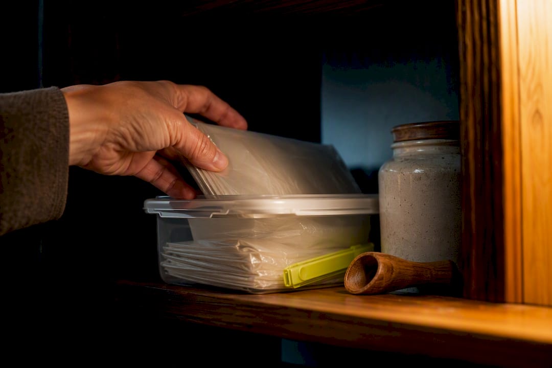 Compostable bag material stored in dark cupboard